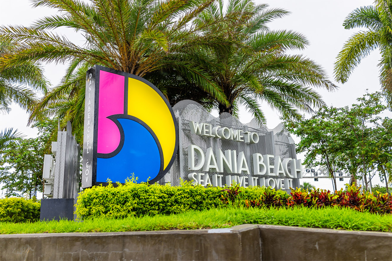 Sign for Dania Beach city near Hollywood, Miami and Ft Lauderdale welcome message signage with colorful design in summer